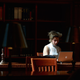 A woman who is being neither harassed nor promoted. Image via Getty.